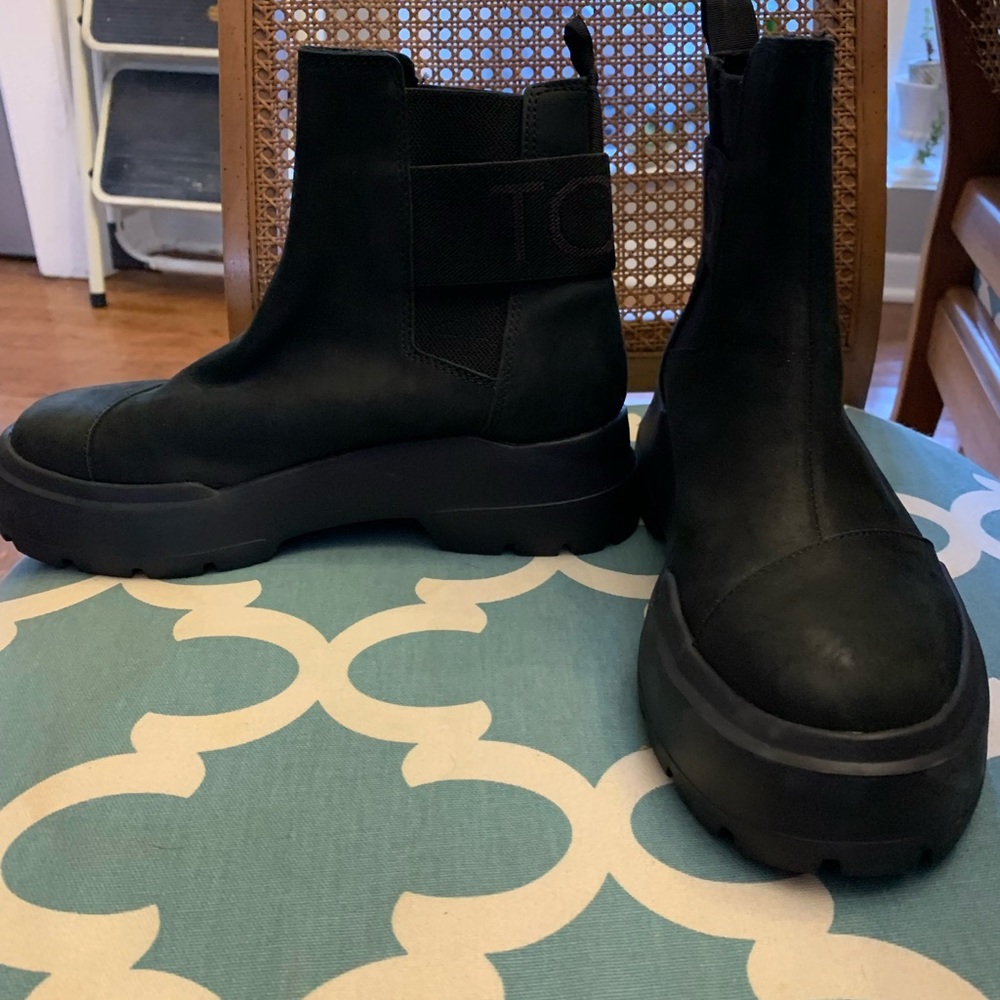 Toms black boots.